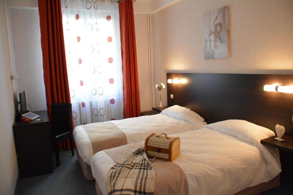 Logis Hotel Restaurant De France Saint-Geniez-dʼOlt Rom bilde